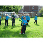 A child holding a rounders bat 2